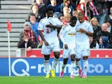 Swansea player Wilfried Bony celebrates his penalty which gives them the lead during the Barclays Premier League match between Stoke City and Swansea City at Britannia Stadium on October 19, 2014