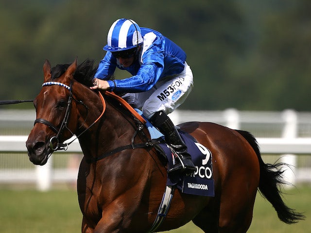 Paul Hanagan riding Taghrooda wins The King George VI and Queen Elizabeth Stakes at Ascot racecourse on July 26, 2014