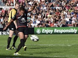 Toulouse's fly-half from England Toby Flood shoots a penalty kick during the European Rugby Champions Cup match between Toulouse and Montpellier at the Ernest Wallon Stadium in Toulouse, southern France, on October 19, 2014