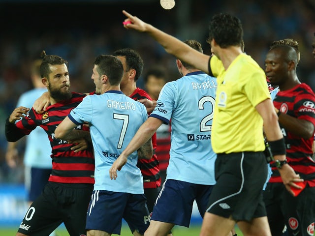 Vitor Saba of the Wanderers scuffles with Corey Gameiro of Sydney FC after being shown a red card during the round two A-League match between Sydney FC and the Western Sydney Wanderers at Allianz Stadium on October 18, 2014
