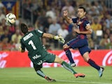 Barcelona's midfielder Xavi Hernandez scores a goal during the Spanish league football match FC Barcelona vs Eibar at the Camp Nou stadium in Barcelona on October 18, 2014