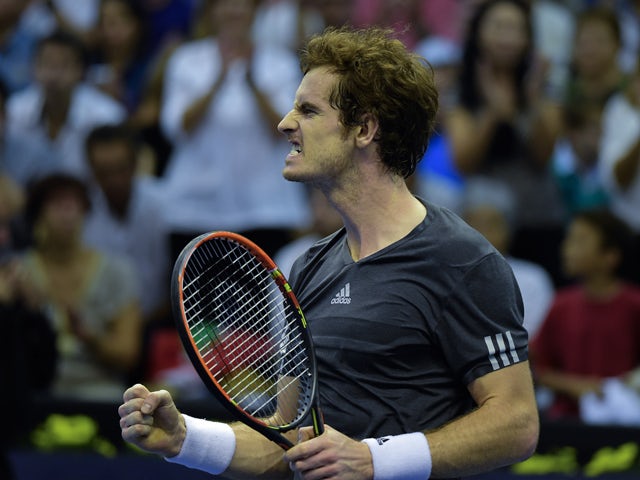 British player Andy Murray celebrates after winning the semi-final tennis match against Spanish player David Ferrer at the ATP Valencia tennis Open at the City of Arts and Science complex in Valencia on October 25, 2014