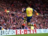 Alexis Sanchez of Arsenal celebrates after scoring the opening goal during the Barclays Premier League match between Sunderland and Arsenal at the Stadium of Light on October 25, 2014