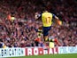 Alexis Sanchez of Arsenal celebrates after scoring the opening goal during the Barclays Premier League match between Sunderland and Arsenal at the Stadium of Light on October 25, 2014
