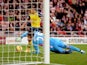 Alexis Sanchez of Arsenal rounds goalkeeper Vito Mannone of Sunderland to score histeam'ssecond goal during the Barclays Premier League match between Sunderland and Arsenal at the Stadium of Light on October 25, 2014