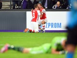 Arsenal's English defender Kieran Gibbs celebrates with Arsenal's Spanish defender Nacho Monreal after scoring during a UEFA Champions League group stage football match Anderlecht vs Arsenal at the Constant Vanden Stock stadium in Anderlecht on October 22