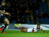 Darly Domvo of Bordeaux slides over to score a try during the European Rugby Challenge Cup match between London Welsh and Bordeaux Begles at the Kassam Stadium on October 23, 2014