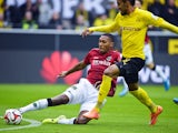 Dortmund's Pierre-Emerick Aubameyang vie for the ball with Hannover's Marcelo during the German First division Bundesliga football match Borussia Dortmund vs Hannover 96 on October 25, 2014