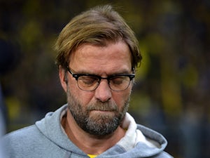 Klopp in no mood to celebrate departure