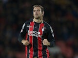 Brett Pitman of AFC Bournemouth in action during the Capital One Cup Second Round match between AFC Bournemouth and Northampton Town at Goldsands Stadium on August 26, 2014 
