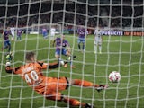 Caen's French forward Mathieu Duhamel scores a penalty in the nets of Lorient's goalkeeper Benjamin Lecomte during the French L1 football match between Caen (SMC) and Lorient (FCL) at the Michel d'Ornano stadium in Caen, northwestern France on October 25,