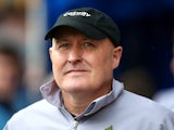 Cardiff manager Russell Slade looks on ahead of the Sky Bet Championship match between Millwall and Cardiff City at The Den on October 25, 2014