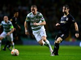 Stephan Johansen of Celtic and Vincent Laban of FC Astra Giurgiu challenge during the UEFA Europa League group D match between Celtic FC and FC Astra Giurgiu at Celtic Park on October 23, 2014
