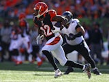 Mohamed Sanu #12 of the Cincinnati Bengals runs with the ball after catching a pass during the third quarter of the game against the Baltimore Ravens at Paul Brown Stadium on October 26, 2014