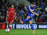 Ipswich player Daryl Murphy shoots to open the scoring during the Sky Bet Championship match between Cardiff City and Ipswich Town at Cardiff City Stadium on October 21, 2014