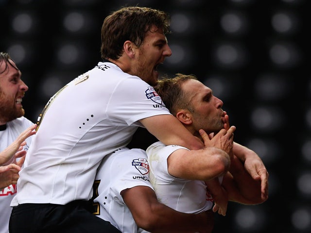 John Eustace of Derby County celebrates his goal during the Sky Bet Championship match between Derby County and Wigan Athletic at the iPro Stadium on October 25, 2014