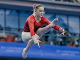 Gabrielle Jupp of Great Britain performs on the Balance Beam during the women's qualification of the 45th Artistic Gymnastics World Championships at Guangxi Sports Center Stadium on October 6, 2014