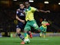 Giuseppe Bellusci of Leeds United battles with Cameron Jerome of Norwich City during the Sky Bet Championship match between Norwich City and Leeds United at Carrow Road on October 21, 2014
