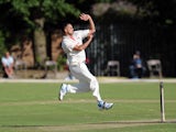 Kabir Ali of Lancashire bowls during day one of the LV County Championship Division One match between Lancashire and Nottinghamshire at Liverpool Cricket Club on July 13, 2014