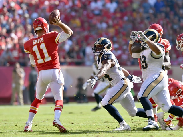 Alex Smith #11 of the Kansas City Chiefs passes against the St. Louis Rams during the first half at Arrowhead Stadium on October 26, 2014
