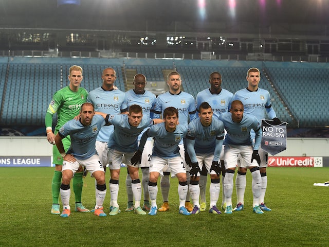 Manchester City players pose for a photo before the Champions League match against CSKA Moscow on October 21, 2014