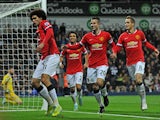 Manchester United's Belgian midfielder Marouane Fellaini celebrates scoring their first goal as West Bromwich Albion's US-born Welsh goalkeeper Boaz Myhill reacts during the English Premier League football match between West Bromwich Albion and Manchester