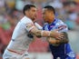  Tim Simona of Samoa is tackled by Matty Smith of England during the Four Nations match between England and Samoa at Suncorp Stadium on October 25, 2014