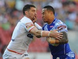  Tim Simona of Samoa is tackled by Matty Smith of England during the Four Nations match between England and Samoa at Suncorp Stadium on October 25, 2014