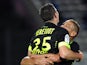 Nantes' French midfielder Jordan Veretout is congratulated by his teammate after scoring a goal during the French L1 football match between Evian Thonon Gaillard (ETGFC) and Nantes (FCN) at the Parc des Sports stadium in Annecy, southeastern France on Oct