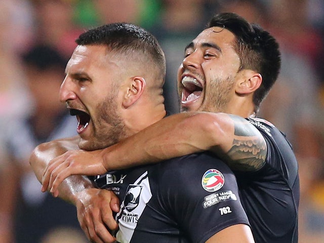 Lewis Brown of New Zealand celebrates a try with team mates during the Four Nations Rugby League match between the Australian Kangaroos and New Zealand Kiwis at Suncorp Stadium on October 25, 2014