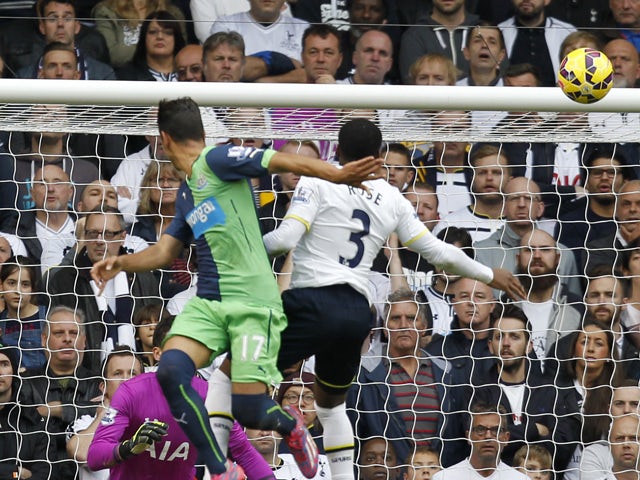 Newcastle United's Spanish striker Ayoze Perez jumps to score their second goal from this header during the English Premier League football match between Tottenham Hotspur and Newcastle United at White Hart Lane in north London on October 26, 2014