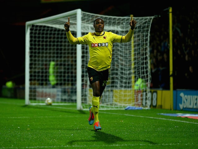 Odion Ighalo of Watford celebrates scoring the first goal during the Sky Bet Championship match between Watford and Nottingham Forest at Vicarage Road on October 21, 2014