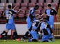Peter Murphy of Wycombe Wanderers (R) celebrates scoring his side's first goal during the Sky Bet League Two match between Exeter City on October 21, 2014