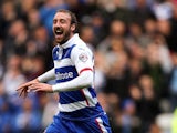 Glenn Murray of Reading celebrates after scoring the opening goal of the game during the Sky Bet Championship match between Reading and Blackpool at Madejski Stadium on October 25, 2014 