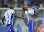 Porto's forward and captain Ricardo Quaresma (R) celebrates with teammate Dutch defender Bruno Martins Indi after scoring a goal during the UEFA Champions League football match against Bilbao on October 21, 2014