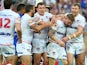 Sam Tomkins of England celebrates a try with team mates during the Four Nations match between England and Samoa at Suncorp Stadium on October 25, 2014