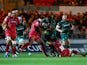 Vereniki Goneva of Leicester Tigers crashes into Michael Tagicakibau of Scarlets during the European Rugby Champions Cup match between Scarlets and Leicester Tigers at Parc y Scarlets on October 25, 2014