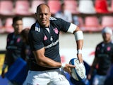 Stade Francais' Italian number 8 and captain Sergio Parisse warms up prior to the French Top 14 rugby union match between Castres Olympique and Stade Francais Paris on August 16, 2014