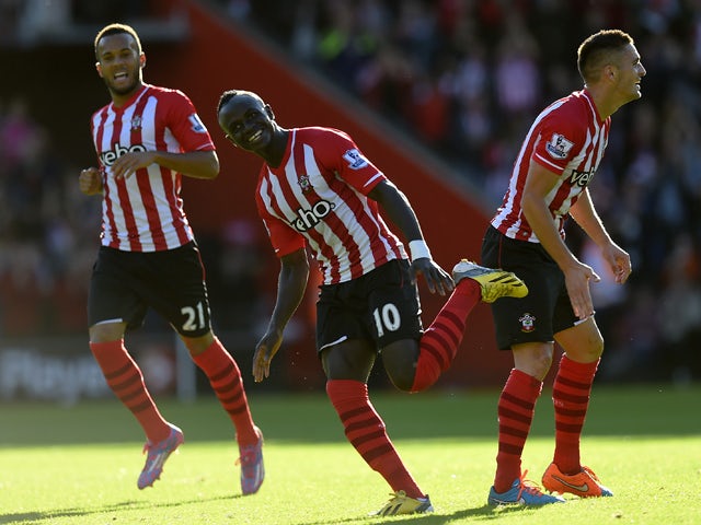 Sadio Mane of Southampton celebrates after scoring the opening goal during the Barclays Premier League match between Southampton and Stoke City at St Mary's Stadium on October 25, 2014