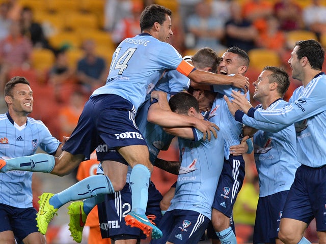 Marc Janko of Sydney is congratulated by team mates after scoring a goal during the round three A-League match between Brisbane Roar and Sydney FC at Suncorp Stadium on October 24, 2014