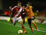 Tommy Rowe of Wolverhampton Wanderers tangles with Jelle Vossen of Middlesbrough during the Sky Bet Championship match on October 21, 2014