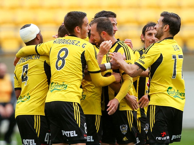 Phoenix players celebrate the goal of Michael McGlinchey during the round three A-League match between the Wellington Phoenix and the Newcastle Jets at Westpac Stadium on October 26, 2014
