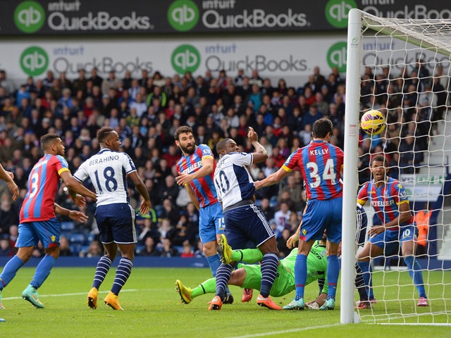 Victor Anichebe of West Brom scores the first goal during the Barclays Premier League match between West Bromwich Albion and Crystal Palace at The Hawthorns on October 25, 2014 