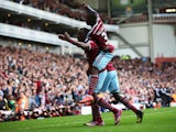 Diafra Sakho of West Ham United celebrates scoring his team's second goal with Enner Valencia of West Ham United during the Barclays Premier League match between West Ham United and Manchester City at Boleyn Ground on October 25, 2014
