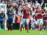 Morgan Amalfitano of West Ham United celebrates scoring the opening goal during the Barclays Premier League match between West Ham United and Manchester City at Boleyn Ground on October 25, 2014