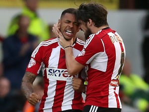 Half-Time Report: Gray fires Brentford ahead