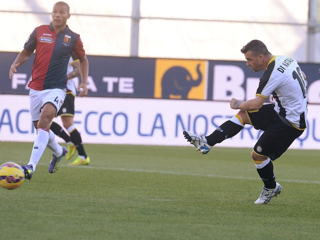 Antonio Di Natale of Udinese Calcio scores his opening goal during the Serie A match between Udinese Calcio and Genoa CFC at Stadio Friuli on November 2, 2014