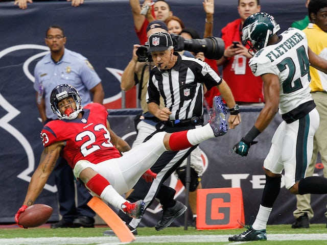 Arian Foster #23 of the Houston Texans scores on a 56 yard reception in the second quarter against the Philadelphia Eagles at Reliant Stadium on November 2, 2014