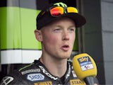 Bradley Smith of Great Britain and Monster Yamaha Tech 3 speaks with journalists at the end of qualifying for the 2014 MotoGP of Australia at Phillip Island Grand Prix Circuit on October 18, 2014