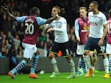 Villa player Christian Benteke (l) confronts Roberto Soldado of Spurs before being sent off during the Barclays Premier League match on November 2, 2014